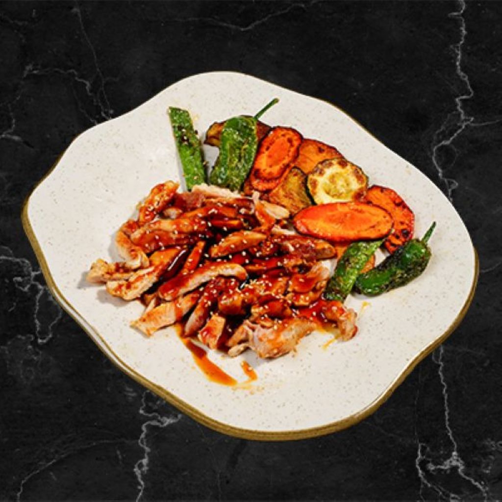 Pollo teriyaki acompañado verduras